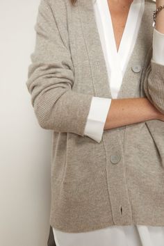 Cashmere Tops With Buttons For Work, Classic Lapel Collar Cardigan For Fall, Classic Cardigan With Lapel Collar And Buttons, Neutral V-neck Cardigan For Work, Classic V-neck Cardigan With Button Cuffs, Elegant Collared Cardigan For Work, Elegant Collared Workwear Cardigan, Classic V-neck Outerwear With Buttons, Elegant Everyday Button-up Outerwear