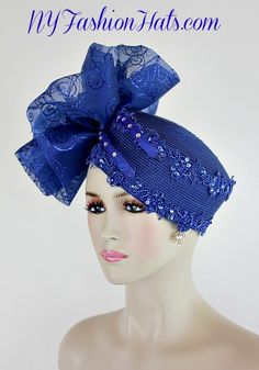 Women's Royal Blue Pillbox Fashion Designer Haute Couture Hat Headpiece Trimmed With A Large Royal Blue Organza Fabric Bow Containing Royal Blue Glitter Spirals. Placed In The Center Of This Beautiful Large Bow Is A Handmade Royal Blue Satin Flower, Accented With Crystal Acrylic Rhinestones And A Glass Rhinestone Center. Two Royal Blue Feathers With Rhinestones Are Placed Along The Front Of This 1920's Flapper Art Deco Era Cocktail Hat. This Formal Hat Can Be Worn In Different Positions. This ladies bespoke formal hat is appropriate to wear for the Kentucky Derby, Melbourne Cup, Royal Ascot, horse races, horse racing, Church, weddings, and special occasion. This lovely hat is also suited for mother of the bride or a bride. This Special Occasion Hat Is Custom Made And Designed By Dress Hats Blue Organza Fabric, Blue Couture, Special Occasion Hats, Fascinator Hats Diy, Formal Hat, Flapper Art, Classy Hats, Cocktail Fashion, 1920's Flapper