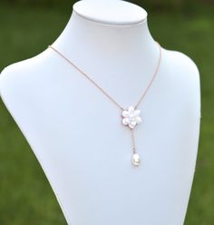 "2018 Collection, MORNING HEIRLOOM Y NECKLACE COLLECTION Featuring hand sculpted white Gardenia and tear drop pearl necklace. Details : - Gardenia made from baking polymer clay. -Flower size approx : 22-23mm - Flower glued on metal plated over brass filigree. - Entire length ; 16 inches + 2 \" extender. Finish with lobster clasp. - Chain finish available in silver plated, antiqued brass, gold and rose gold. - Sterling silver and gold filled chain available with additional cost, ( the filigree in White Flower-shaped Necklace With Pearl Pendant, White Flower-shaped Pearl Pendant Necklace, White Flower Shaped Necklace With Adjustable Chain, White Flower Pendant Necklace With Pearl Drop, White Pearl Drop Flower Pendant Necklace, White Teardrop Pendant Jewelry With Pearl Chain, Pearl White Flower Jewelry With Pearl Charm, White Flower Pendant Jewelry With Adjustable Chain, Pearl White Flower-shaped Jewelry With Pearl Charm