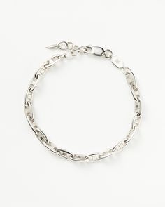 Mariner Chain Bracelet | Silver Plated. Our Take on the Classic Anchor-Style Chain. This Versatile Chain Bracelet Eatures Interlocking Oval Links for a Timeless Look, the Ultimate Arm Stack Staple. Wear Solo or Stack with Other Chunky Chains. Metal: Rhodium Plate on Brass Length: 185mm Width: 5mm Weight: 7. 45g Product Code: Yn-S-B3-Ns-S Arm Stack, Chain Bracelet Silver, Gold And Silver Earrings, Gold And Silver Bracelets, Pearl Necklace Earrings, Silver Plated Bracelet, 6 Rings, Silver Chain Bracelet, Pearl Gemstone