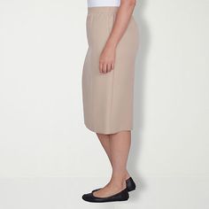 Slip into our suit skirt for a polished and professional look.Front Style: Flat FrontClosure Type: Elastic BackPockets: 2 Side Slip PocketsRise: At WaistApparel Length: 27.5 InchesFiber Content: 100% PolyesterFabric Description: WovenLining: UnlinedSkirt Length: Knee LengthCare: Machine WashSkirt Type: Pencil SkirtsCountry of Origin: Imported Elegant Skirted Bottoms For Daywear, Classic Stretch Skirt Bottoms, Classic Stretch Skirt, Classic Formal Skirted Bottoms, Classic Knee-length Office Skirt, Elegant Daywear Pencil Skirt, Elegant Pencil Skirt For Daywear, Classic Knee-length Workwear Bottoms, Fitted Pencil Skirt For Daywear