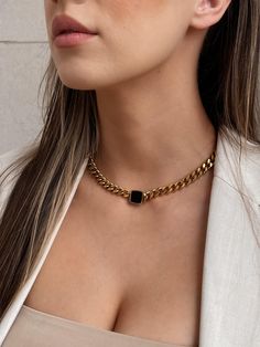 Be unique, edgy, and polished in our Nadia Chunky Chain Necklace that features a black square as the focal point amongst smooth roll of Cuban curb chain. 18K Gold Plating on Stainless Steel. Waterproof. About 15 1/2 in. + 2 in. extension Shop the matching Nadia Ring and Nadia Bracelet to complete the look. LAST CHANCE = FINAL SALE Trendy Black Chain Link Jewelry, Black Link Chain Jewelry, Everyday Black Chain Link Jewelry, Black Chain Link Jewelry For Everyday, Black Metal Jewelry With Chunky Chain, Black Jewelry With Rectangular Box Chain Links, Black Chunky Chain Link Jewelry, Black Cuban Link Chain Necklace Gift, Everyday Black Curb Chain Necklace