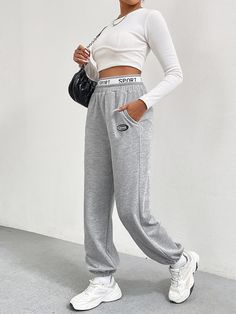 F00215614-103 Athleisure Sweatpants With Logo Waistband, Logo Waistband Athleisure Sweatpants, Sporty Joggers With Logo Waistband For Streetwear, Moisture-wicking Cotton Pants For Sports Season, Moisture-wicking Cotton Pants For Sports, Casual Streetwear Sweatpants With Logo Waistband, Sporty Gray Sweatpants With Elastic Waistband, Casual Sweatpants With Logo Waistband For Streetwear, Baggy Cotton Pants For Sports