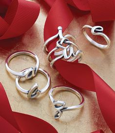 James Avery Delicate Heart Knot Ring Silver Open Ring Jewelry For Valentine's Day, Valentine's Day Silver Open Ring Jewelry, Anniversary Sterling Silver Midi Rings With Open Band, Anniversary Sterling Silver Open Band Midi Rings, Sterling Silver Open Band Midi Rings For Anniversary, Adjustable Silver Initial Ring For Promise, Silver Midi Rings For Anniversary, Valentine's Day Adjustable Open Stackable Rings, Classic Open Ring For Valentine's Day