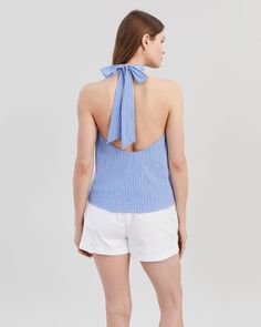 The Barbara Halter Top, made in our cotton poplin fabric, features a high neckline with an open back and ties at the neck. Pair with the Loretto Short. Sleeveless Cotton Top With Bow Tie Back, Spring Beach Tops With Bow Tie Back, Chic Cotton Blouse With Tie Back, Summer Cotton Tie Back Blouse, Summer Cotton Blouse With Tie Back, Chic Cotton Halter Neck Top, Cotton Tie-back Tops For Daywear, Cotton Tie Back Tops For Daywear, Cotton Tops With Tie Back For Daywear