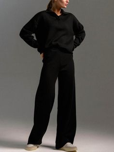 Upgrade your fall wardrobe with our cozy Black Long Sleeve Knit Sweater and Pants Set. Perfect for any occasion, whether it's traveling or lounging at home. Stay comfortable and stylish with this must-have set. Made with high-quality, warm materials to keep you comfortable all day long. 50% Viscose30% Polyester20% Nylon Versatile Solid Color Sweatpants For Fall, Fall Straight Leg Sweats With Ribbed Waistband, Comfy Sweats For Fall Loungewear, Comfy Fall Sweats For Loungewear, Solid Sweatpants For Workwear In Fall, Comfy Fall Loungewear Sweats, Relaxed Full Length Sweatpants For Fall, Relaxed Full-length Sweatpants For Fall, Versatile Wide-leg Sweatpants For Fall