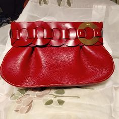 Unique Design. Brand New, Never Used. Guarantee Authentic . Still Smell New Leather. Come With Dust Bag And Tag, Card, No Box. Kindly Offers Are Appreciated. Thank You Luxury Red Clutch With Gold-tone Hardware, Chloe Parfum, Chloe Perfume, Chloe Bags, Black Leather Clutch, Embroidered Canvas, Zippered Clutch, Wristlet Clutch, Leather Clutch Bags