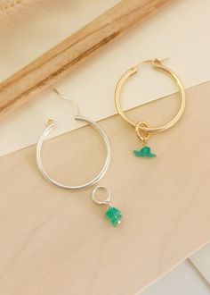 We wanted to add a pop of color to our classic hoops! These gemstone charms come in a pair of two so that you can add them to our classic hoops found here: Etta Hoop Earrings | Women's Gifts | Personalized Gifts | Handmade – Going Golden (going-golden.com) Details: Raw gemstones can vary in size and color, as no two are identical Available in 14K yellow gold-filled or sterling silver designed to fit on our Etta Hoops Hoops are sold separately Handmade in Brownsburg, Indiana Everyday Hoop Jewelry With Dangling Charms, Hoop Earrings With Charms For Jewelry Making, Everyday Hoop Earrings With Charms, Everyday Small Hoop Earrings With Dangling Charms, Green Sterling Silver Small Hoop Earrings, Charm Hoop Earrings As Gift, Small Hoop Earrings With Dangling Charms, Hoop Earrings With Charms As Gift, Sterling Silver Hoop Earrings With Charms