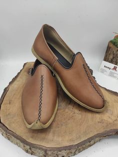 These are genuine leather, handmade men's shoes. Very useful soft shoes. Made with naturel leather and naturel dyed. There are many diffirent color options.   Our processing time 2-10 bussines days, But must of time we are shipping your order very earlier. ( express shipping, Fedex, Ups, Dhl, Tnt ) Every size is available, 5 us men's to 13.5 us men's, 37 eu men's to 50 eu men's. Men's shoes are %100 naturel. ALL ABOUT TURKISH YEMENI SHOES Put away those rubber flip flops.  The only shoes you nee Traditional Leather Loafers, Traditional Plain Toe Leather Shoes, Leather Hand-stitched Closed Toe Moccasins, Traditional Moccasins With Stitched Sole, Hand-stitched Leather Moccasins With Closed Toe, Artisan Brown Leather Shoes, Brown Artisan Leather Shoes, Traditional Leather Moccasins With Rubber Sole, Traditional Brown Leather Shoes With Leather Footbed