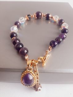 New Amethyst Semiprecious Stone, Faceted Crystal  and Gold 14K  Bracelet from Peru. 8 1/2  inches length. Elegant Rosary Bracelet For Healing, Round Amethyst Bracelets With Gemstone Accents, Elegant Gemstone Beads Charm Bracelet For Healing, Elegant Amethyst Crystal Bracelet With Natural Stones, Elegant Amethyst Crystal Bracelet For Jewelry Making, Elegant Healing Charm Bracelet With Natural Stones, Spiritual Amethyst Bracelets With Gemstone Accents, Gold Amethyst Gemstone Bracelets, Handmade Elegant Amethyst Crystal Bracelet