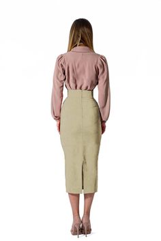 This chic Champagne Gold Cotton Midi Skirt is a fashionable and timeless piece crafted with premium cotton fabric. Perfect for formal and semi-formal occasions, the skirt has a flattering midi length and an effortless fit. Embody timeless sophistication and look great for any special event. Product Features Please Compare your Measurements To our Size Chart Before Purchase Fully Lined Fitted waist Center back seam with invisible zipper Regular fit- true to size Skirt Length is 30 Inches from Wai Midi Formal Skirt, Elegant Semi-formal Fall Skirt, Chic Long Pencil Skirt For Fall, Elegant Fall Office Skirt, Formal Long Pencil Skirt For Fall, Elegant Knee-length Skirt For Fall, Chic Fall Midi Pencil Skirt, Tailored Midi Skirt For Workwear, Chic Lined Pencil Skirt For Fall