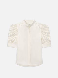 This delicate silk blouse epitomizes modern femininity, featuring a high neckline and boldly puffed sleeves with ruched detailing. We love it tucked into cropped wide jeans with leather slides and a slim belt. Cropped Wide Jeans, Slimmer Belt, Wide Jeans, Leather Slides, Beautiful Blouses, Puffed Sleeves, White Summer, Ruched Dress, Cami Dress