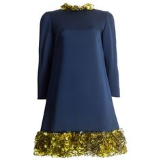 Presenting a vintage blue silk evening mini dress, a true treasure of opulence and glamour. This exquisite dress is adorned with gold circular mirrored disks and beads, adding a touch of luxury and sophistication to the ensemble. With a zip fastening at the back, the dress promises a seamless and secure fit, ensuring you look and feel stunning at any special occasion. The silk lining adds a luxurious touch, reflecting the high-quality craftsmanship of the dress. While the designer remains unknown, the couture number inside adds an air of mystery and exclusivity to this remarkable piece. Prepare to be enchanted by the allure of this vintage blue silk evening mini dress, a standout piece that captures the essence of timeless elegance and allure. With its impeccable craftsmanship and lavish d Blue Silk Mini Dress, Gold Evening Dresses, Evening Mini Dresses, Ideal Wardrobe, Evening Dresses With Sleeves, Beaded Cocktail Dress, Designer Evening Dresses, Couture Mode, Donatella Versace