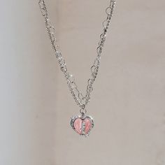 Peachy Pink Heart Necklace - Sweet Delight 🍑💖 🍑 Sweet and Juicy: The Peachy Pink Heart Necklace is a delightful accessory featuring a charming heart pendant in a peachy pink hue. It captures the essence of sweet treats and the joy of indulgence, making it a perfect choice for those who want to express their playful spirit. 💖 Elegant Love: Wearing this necklace is like carrying a piece of sweet love with you. It's a charming addition to any outfit, whether it's a romantic date night or a spec Pink Heart-shaped Jewelry For Friendship, Sweet Pink Necklaces For Valentine's Day, Sweet Pink Necklace For Valentine's Day, Pink Heart Pendant Charm Necklace For Mother's Day, Dainty Pink Charm Necklace For Mother's Day, Pink Heart Charm Necklace With Heart Pendant, Pink Dainty Necklace For Mother's Day, Dainty Heart Necklace For Friendship, Pink Heart Charm Necklace For Mother's Day