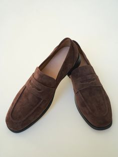 Details Whether you're heading to the office or out on weekend errands, this sleek loafer is ready to keep your feet comfortable for the day. Soft hand-finished leather or suede leather upper Breathable soft fabric suede lining High traction flexible lightweight rubber outsole Heel Height: 1/3 Inch Shipping & Return Free US shipping on orders over $100.Free International shipping on orders over $300. For more details click HERE. Formal Suede Slip-ons With Round Toe, Business Suede Slip-ons With Round Toe, Suede Leather Shoes With Leather Lining For Work, Suede Moc Toe Dress Shoes For Business, Suede Leather Shoes With Leather Sole For Work, Formal Suede Leather Shoes With Leather Footbed, Suede Loafers With Leather Lining And Round Toe, Formal Suede Moccasins With Round Toe, Brown Suede Tassel Loafers