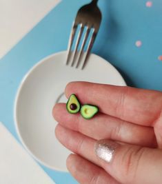 🚀!Important - Christmas orders: If you want to make sure that your package will get to you before Christmas, please choose - DHL Express shipping - upgrade (2-4 day shipping time) at the checkout! Standard postal shipping from Hungary can take 15 business days with delays during the Holiday season! This cute Avocado Earrings will definitely make your days happier! :) If you love to wear food earrings or you are searching avocado gifts for avocado lovers then you came to the best place! This is a mismatched earrings that represents two parts of a ripe avocado - one halve has a seed and the other one is empty. D E T A I L S: * Handmade Avocado Stud Earrings  * Made from Polymer Clay * Length: 0.6 inches (1.5 cm) * Height: 0.2 inches (0.6 cm) * Mismatched: one halve has a seed and the other Tiny Green Earrings For Gift, Small Green Earrings For Gift, Avocado Gifts, Avocado Earrings, Eco Gift Wrapping, Food Tattoos, Earrings Food, Cute Avocado, Kawaii Earrings