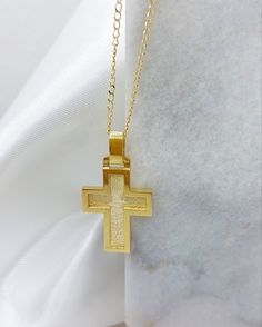 Handmade Gold cross pendant with matte finished in the central part and  shine finished around the perimeter of cross. A Baptism orthodox cross.   A beautiful handmade cross in 14k gold or 18k gold  wich manufactured in our workshop in Sparta. Ideal choice as Orthodox baptismal cross for baby Girls or baby Boys  but also as a special and unique piece of jewelry that you can wear every day. A large and heavy gold cross which can be personalized  by engraning on the back side of the cross a name o 14k Gold Cross Necklace For First Communion, Gold Cross Jewelry For Confirmation, Yellow Gold Cross Necklace For First Communion, Gold Cross Pendant Jewelry For Baptism, 14k Gold Cross Pendant Jewelry For Baptism, Gold Crucifix Cross Necklace For Baptism, Yellow Gold Cross Necklace For Baptism, Yellow Gold Crucifix Necklace For Baptism, Yellow Gold Cross For Baptism