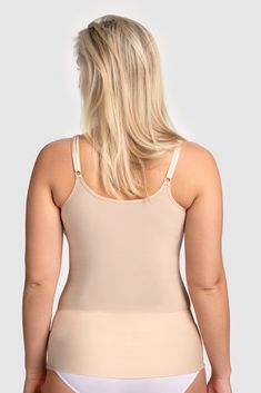 A unique camisole that cools the skin! Perfect in warm conditions. Made from the exclusive high-tech material WinCool, which according to testing cools the skin by 1-2°C.

We also recommend using Cool Sensation as sleepwear, especially on warm summer nights. The material’s moisture-wicking properties ensure that skin stays dry and the garment doesn’t feel damp. The camisole is incredibly soft and comfortable to wear. Narrow, adjustable shoulder straps. Laser-cut lower edge.
• Unique functional m Fitted Camisole With Built-in Bra For Relaxation, Fitted Tops With Built-in Bra For Relaxation, Full Coverage Shapewear With Built-in Bra For Loungewear, Snug Fit Sleeveless Tops With Built-in Bra, Seamless Camisole Bodysuit For Loungewear, Seamless Second-skin Top For Loungewear, Seamless Second-skin Tops For Loungewear, Beige Tank Top With Built-in Bra For Loungewear, Relaxation Camisole Top