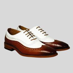 Bespoke Men Handmade Brown & White Colour Pure Leather Wing Tip Brogue Lace Up Oxford Shoes, Wingtip Shoes, Event Shoes Wedding Shoes We are a dedicated team that comes together to create beautiful shoes with classic English craftsmanship. Our focus is on creating high-quality products for our clients and their customers. Our team of designers and craftsmen are passionate about creating the perfect fit. Our shoes and boots are handmade and made to measure upon your feet measurement, with attenti White Oxford Leather Shoes With Cap Toe, White Wingtip Oxfords For Business, White Brogue Dress Shoes With Plain Toe, White Dress Shoes With Brogue Detailing, White Brogue Oxfords For Formal Occasions, White Cap Toe Oxfords With Goodyear Welt, White Wingtip Dress Shoes, White Oxford Dress Shoes For Derby, White Plain Toe Lace-up Business Shoes