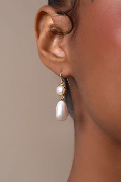 The design of Mira features a freshwater drop pearl suspended from a pearl encased in a 14k gold-filled bezel cup.The gold hook on these earrings is extra fine and comfortable to wear.  A timeless and versatile accessory, these earrings are suitable for any occasion, from formal events to casual outings. Packaged in an elegant plastic-free reusable jewelry box, they make the perfect gift or special treat for oneself.  14k gold-filled components Freshwater pearls Hypoallergenic, suitable for even the most sensitive skin Delivered in a 100% silk jewelry pochette inside a gift box Sustainable magnetic closure jewelry box and customizable card   Please note, as we use only natural pearls, shape and size may vary slightly.  We offer a one year guarantee from the date of delivery. Lost an earrin Elegant Drop Pearl Earrings In 14k Gold Filled, Elegant 14k Gold Filled Pearl Drop Earrings, Elegant 14k Yellow Gold Filled Teardrop Earrings, Elegant 14k Gold Filled Teardrop Earrings, Anniversary 14k Gold Filled Pearl Drop Earrings, Classic Gold Long Drop Pearl Earrings, 14k Gold Filled Teardrop Pearl Earrings For Anniversary, Teardrop 14k Gold-filled Pearl Earrings For Anniversary, Teardrop 14k Gold Filled Pearl Earrings For Anniversary