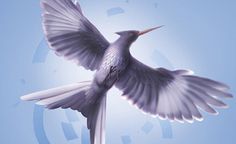 the cover of mocking jay by suzanne collins, with a bird flying over it