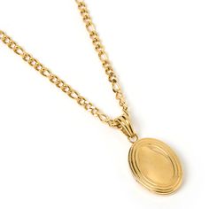 Our Classic Locket Necklace is here to melt hearts with memories! The perfect gift for sentimental value, this gorgeous pendant has an easy open and close feature so you can insert a picture and cherish memories for a lifetime! 14k Gold (1 Micron Plating)  Stainless Steel Base  E-coating for a premium finish  Lead & Nickel Free  Tarnish-Free  Water Resistant Timeless Pendant Locket Necklace For Anniversary, Medallion Locket Necklace For Anniversary Gift, Anniversary Gift Medallion Locket Necklace, Elegant Locket Necklace With Detachable Pendant, Medallion Locket Necklace For Anniversary, Oval Locket Necklaces For Anniversary, Elegant Oval Pendant Locket Necklace For Keepsake, Elegant Initial Pendant Locket Necklace For Anniversary, Elegant Oval Pendant Keepsake Jewelry