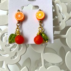 Cute Summertime Fashion Earrings, Gold Tone Wire And Post, Glass Beads And Made With Love . 1 Orange 2 Lemons 3 Lime Green Lemon Nickel-free Yellow Beaded Earrings For Gifts, Nickel-free Yellow Beaded Earrings As Gift, Nickel Free Yellow Beaded Earrings For Gift, Yellow Round Beaded Earrings For Gifts, Cute Orange Jewelry With Colorful Beads, Yellow Fruit Design Earrings For Gift, Yellow Fruit Design Earrings Gift, Yellow Fruit Design Earrings As Gift, Handmade Orange Fun Jewelry