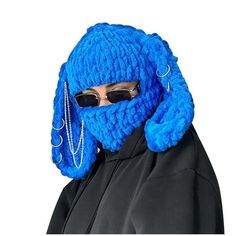 a person wearing a blue knitted mask with chains on it's face and sunglasses