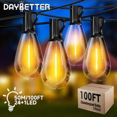 the light bulbs are hanging from the wires and there is a box underneath them that says, daybetter