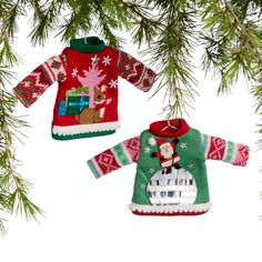 two christmas sweater ornaments hanging from a tree