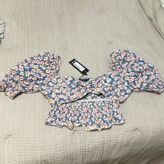 Nasty Gal Pink Floral Puff Sleeve Crop Top With Tags. Front Of The Shirt Has A Cut Out. Summer Floral Print Crop Top With Puff Sleeves, Cute Floral Print Crop Top, Cute Cropped Crop Top With Floral Print, Summer Floral Print Puff Sleeve Crop Top, Cute Cropped Floral Print Crop Top, Cotton Puff Sleeve Crop Top With Ruffles, Cotton Crop Top With Puff Sleeves And Ruffles, Trendy Fitted Puff Sleeve Top With Floral Print, Trendy Floral Print Puff Sleeve Tops