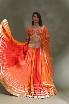 Shop beautiful orange and red lehenga online in USA with gota border and dupatta. Look your best at weddings and parties in Indian dresses, designer lehengas, Anarkali suits, designer gowns, salwar suits, sharara suits from Pure Elegance Indian fashion store in USA.-full view Festive Orange Sharara With Sheer Dupatta, Traditional Drape Orange Sharara With Sheer Dupatta, Designer Orange Sharara For Navratri, Red Floor-length Lehenga With Gota Work, Orange Sharara With Sheer Dupatta For Diwali, Orange Sharara With Sheer Dupatta For Navratri, Traditional Orange Sharara With Sheer Dupatta, Orange Sharara With Dupatta In Traditional Drape, Orange Anarkali Set With Sheer Dupatta