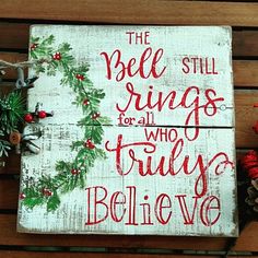 a wooden sign that says the bells still sing for all who truly believe