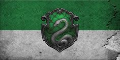 a green and white wall with a snake emblem on it's side, in the middle