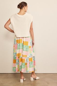 Say hello to your new favorite statement piece - the Magnolia Patchwork Skirt! Crafted in a flowy maxi style with a playful mix of colorful floral prints, this skirt is perfect for warm weather. With a ruffled bottom and an elastic waist complete with an attached drawstring, comfort and style have never looked so good. Model is 5''10 and wearing a size small Patchwork Skirt, Maxi Styles, Sweater Skirt, Say Hello, Warm Weather, Magnolia, Sweater Top, Elastic Waist, Dress Skirt