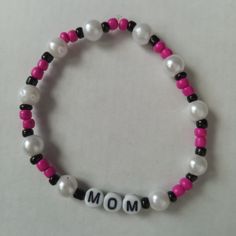 New Mom Beaded Statement Bracelet Handmade With Glass Beads Made With Durable Stretchy Elastic Cord Bright Neon Pink Beads, Pearls And Black Accent Beads Hand Crafted With Love And Care, Unique One Of A Kind They Are Sure To Bring A Pop Of Color And Style To Any Outfit While Making A Bold Fashionable Statement This Would Make A Great Gift Yourself Or Someone You Care About For Valentines Day, Mothers Day, A Birthday, Date Night, Anniversary Or Any Other Special Occasion. Contact Me If You Have A Mothers Day Clay Bead Bracelet Ideas, Birthday Date Night, Clay Bead Bracelet Ideas, Bracelet With Pearls, Rose Quartz Bracelet Beads, Hammered Cuff Bracelet, Clothes Athletic, Bead Bracelet Ideas, Preppy Bracelets