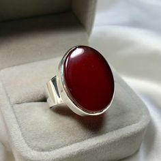 Indulge in the captivating beauty of this bold agate sterling silver statement ring. Handcrafted with meticulous attention to detail, this stunning piece of gemstone jewelry is sure to make a statement wherever you go. " Details " - Natural Brown Agate - Main Stone Size: 20.00x18.00mm Approximate - Ring Front width: 21.5mm - Band Width: 6.00mm - Band Thickness: 2.00 mm - Gross Weight: 15.00 grams - Handmade Ring - Sterling Silver 925 (Hallmarked) - Dimensions and Weight Depends on Variations in Modern Carnelian Gemstone Jewelry, Elegant Oval Ruby Ring With Natural Stones, Elegant Large Stone Ruby Ring Gift, Elegant Ruby Ring With Large Stone For Gift, Elegant Formal Agate Jewelry, Formal Natural Stones Gemstone Ring, Elegant Silver Agate Gemstones, Wedding Agate Cabochon Jewelry, Elegant Formal Rings With Natural Stones