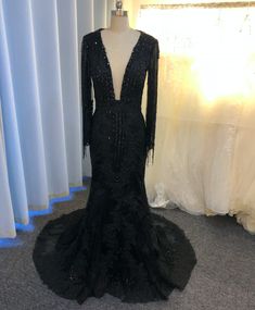 Black Sequin Dress For Banquet, Black Embellished Gown For Banquet, Embellished Black Gown For Banquet, Glamorous Black Wedding Gown, Black Embellished Long Sleeve Gown, Black Long Sleeve Embellished Gown, Black V-neck Gown For Banquet, Black Evening Gown For Wedding, Black Evening Wedding Gown