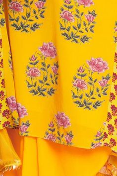 Ochre yellow panelled short kurta with all-over multi-color floral motif print. Comes with draped dhoti pants.
Component: 2
Embroidered, Printed
Neckline: Round
Sleeve Length: Full
Color: Yellow
Draped pants
Side panels
Tassel tie-up back - Aza Fashions Yellow Floral Print Sets With Traditional Drape, Yellow Sets With Floral Print And Traditional Drape, Traditional Yellow Floral Print Sharara, Yellow Floral Print Palazzo Set With Straight Kurta, Bollywood Style Yellow Floral Print Sharara, Yellow Bollywood Kurta With Printed Motifs, Yellow Palazzo Set With Printed Motifs For Navratri, Yellow Sharara With Printed Motifs For Navratri, Navratri Yellow Palazzo Set With Printed Motifs