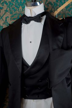 "The pricing on this listing is for a 3pc Handsewn Tux with the muslin fitting. We can make a similar tux in our Decadence '89 style with less handwork for a lower price. 1909 BESPOKE: These are our completely custom handmade suits. Each suit is crafted for an individual customer based on his tastes and lifestyle, and the price of the suit includes us spending 4 hours on designing your suit alone and sketching ideas. These suits are completely patterned, cut, and sewn here in our studio in Denve Fitted Suits For Black-tie Events With Shawl Collar, Fitted Suit With Shawl Collar For Black-tie Events, Elegant Fitted Tuxedo With Shawl Collar, Semi-formal Fitted Silk Three-piece Suit, Classic Silk Suits With Notch Lapel, Fitted Semi-formal Suit With Shawl Collar, Fitted Shawl Collar Suit For Semi-formal Events, Fitted Shawl Collar Suit For Semi-formal Occasions, Tailored Silk Three-piece Suit For Semi-formal Occasions