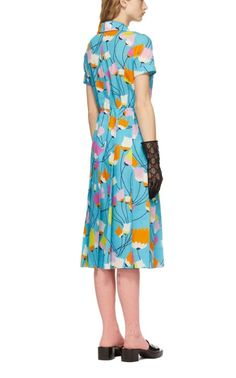 Short sleeve cotton and linen-blend poplin mid-length dress in blue. Multicolor floral pattern printed throughout. Open spread collar. Button closure at front. Belt loops, detachable belt with pin-buckle fastening, and pleats at elasticized waist. Zip closure at back. Tonal hardware. Supplier color: AzureMidi lengthComposition: 70% cotton, 30% linen.Dry CleanMade in Italy. Fitted Gucci Floral Print Dresses, Gucci Fitted Floral Print Dress, Blue Retro Midi Dress For Spring, Retro Blue Midi Dress For Spring, Blue Floral Print Midi Dress For Work, Blue Floral Midi Dress For Work, Gucci Fitted Dress For Spring, Chic Gucci Midi Dress, Gucci Knee-length Dress For Spring