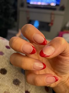 Hoco Nails For A Red Dress, Short Tip Christmas Nails, Short Almond French Tip Nails Christmas, Red And White Tips Nails, Red French Tip With Glitter Line, Ted French Tips Nails, Christmas Nails Red And Green French Tip, Red Christmas Nails Short Almond, Christmas Nails Basic Short