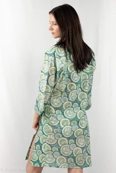 This short kimono is hand block printed by local Indian artisans using all Azo free colors.Style tips:Oh so relaxing, our Kimono can be worn on any leisure event.Or it can be worn over any bikini for a fun beach day. Tiny button detail on the side seam can help you keep desired length of opening. Dimension and Care:37" in Length, one size fits all with a wrap knot at waistHand wash separately in cold waterDo not Wring Line dry, steam iron onlyColors may bleed while washing*Actual color may sligh Beach Green Printed Tunic, Green Relaxed Fit Beach Tunic, Summer Block Print Kimono With Kimono Sleeves, Summer Block Print Long Sleeve Kimono, Spring Green Hippie Kaftan, Printed Green Beachwear Kimono, Green Printed Beachwear Kimono, Summer Batik Print Long Sleeve Kimono, Beachwear Green Printed Kimono