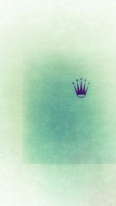 a blue crown floating in the air on top of a green and white background,