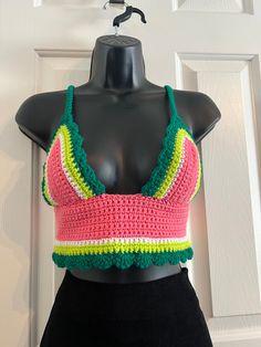 🍉 Seedless Watermelon, Scalloped Crochet summer top! Stunning fruit aesthetic is a perfect nod to the summer favorite watermelon 🍉  Watermelon pink, white, lime green and dark green "rind" on this unique gorgeous, scalloped pattern cropped crochet top, in a sweet summer mix of colors!  🤍💚Fun, pops of bright pink, pure white and perfect lime and forest green colors for summer! You will stand out in this gorgeous crocheted shirt. Perfect for a summer music festival, farmers market, concert, food festival or just a stunning piece for the boho style. Bright, blended colors are a show stopper! ☀️ Shirt is not lined but tight crochet pattern allows for little to no show through. Such a gorgeous, one of a kind shirt, perfect to stand out in a crowd!  Criss-Cross tie is single crocheted for a Concert Food, Crocheted Shirt, Seedless Watermelon, Fruit Aesthetic, Crochet Festival, Blended Colors, Summer Music Festivals, Festival Concert, Crochet Summer Tops