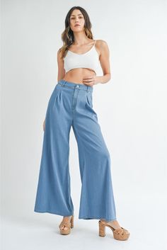 Fall for the silhouette of these high-waist jeans crafted in a light wash and punctuated with retro-inspired wide hems. • Button/Belt Loops• Wide Leg• Pleated Detail Jean Crafts, Denim Trousers, Wide Leg Denim, New Tops, Birthday Dresses, Resort Wear, Retro Inspired, High Waist Jeans, Denim Dress