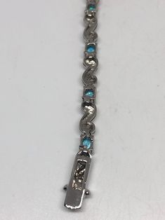 This Blue Topaz bracelet is very lively and bright. The stones are deep colors and well matched. The sterling silver is very solid with antiqued rhodium finish 7.5 inches My jeweler can shorten this for a $20 fee All jewelry is shipped in a nice gift box. Check out our over a THOUSAND great reviews Engraving is $4 per letter and is not always perfect depending on the piece. It can take a few days if the jeweler is busy. This is payable to Paypal Judithsltd@gmail.com Formal Silver Blue Topaz Bracelet, Formal Multi-stone Sterling Silver Bracelet, Blue Sterling Silver Bracelet, Stamped 925, Gift, Fine Jewelry Silver Bracelet With Blue Topaz, Silver Blue Topaz Bracelet Fine Jewelry, Blue Sterling Silver Bracelet Gift, Silver Blue Topaz Bracelets Fine Jewelry, Sterling Silver Gemstone Bracelet Fine Jewelry, Blue Sterling Silver Bracelet With Polished Finish