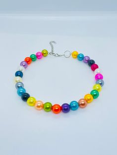 Kids  Beaded  Colourful Choker Necklace. Handmade beaded Kids choker necklace. Perfect for casual wear. Assorted Kids Choker Necklace. Gift ideas/Stocking Filler Made in Kenya. Note; The Measurement are taken while the choker are fastend. Casual Rainbow Beaded Necklaces With Round Beads, Casual Rainbow Beaded Necklaces, Casual Rainbow Beaded Necklace, Multicolor Necklaces For Birthday, Cute Multicolor Choker Gift, Casual Round Bead Necklaces For Party, Beaded Necklaces With Colorful Beads For Birthday, Adjustable Colorful Beads Necklace For Birthday, Cute Multicolor Beaded Necklaces For Parties