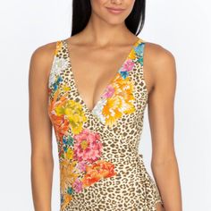 This Stunning One-Piece Swimsuit Will Stand Out Thanks To Its Chic Wrap Detail. This Detail Creates A Stylish Effect When Combined With The Floral And Leopard Print. This Comfortable And Flattering Swimsuit Is A Modern Take On One-Piece Swimwear. Complete The Look With An Oversized Sun Hat And Some Cork Sandals. Multicolor Fitted V-neck Swimwear, Elegant Fitted Multicolor Swimwear, Fitted Multicolor V-neck Swimwear, Oversized Sun Hat, Surf Swimsuit, Flattering Swimsuits, White One Piece, Cork Sandals, Floral One Piece Swimsuit