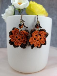 Micro-crocheted Sakura floral earrings in orange spice and beige brown are perfect for fall. Assembled with dark orange beads and antique copper-toned nickel-free findings. These stylish earrings for everyday wear are very lightweight.  Suitable for different occasions. Cute and cozy, they will make you stand out even in a formal dress. Aprox. 2" in drop length. Made to order. If there are any questions, please feel free to contact me. As a handmade item, slight variation is a special part of ea Handmade Brown Beaded Earrings, Gift Brown Copper Beaded Earrings, Vintage Brown Beaded Earrings As Gift, Brown Flower Earrings With Ear Wire, Brown Copper Beaded Earrings For Gift, Vintage Brown Beaded Earrings For Gift, Bohemian Orange Flower Earrings For Gift, Crochet Fall Earrings, Handmade Brown Bohemian Flower Earrings